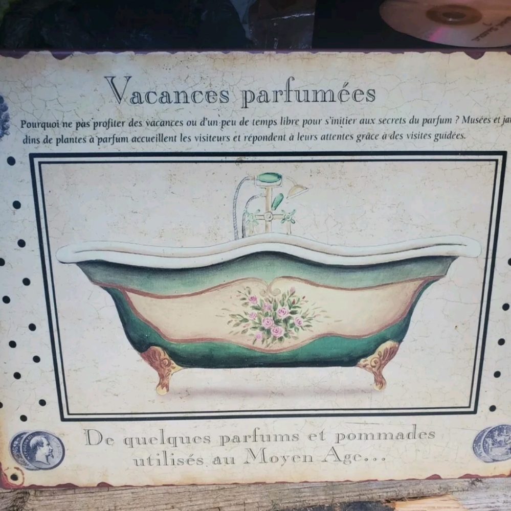 Vacances Parfumees metal sign